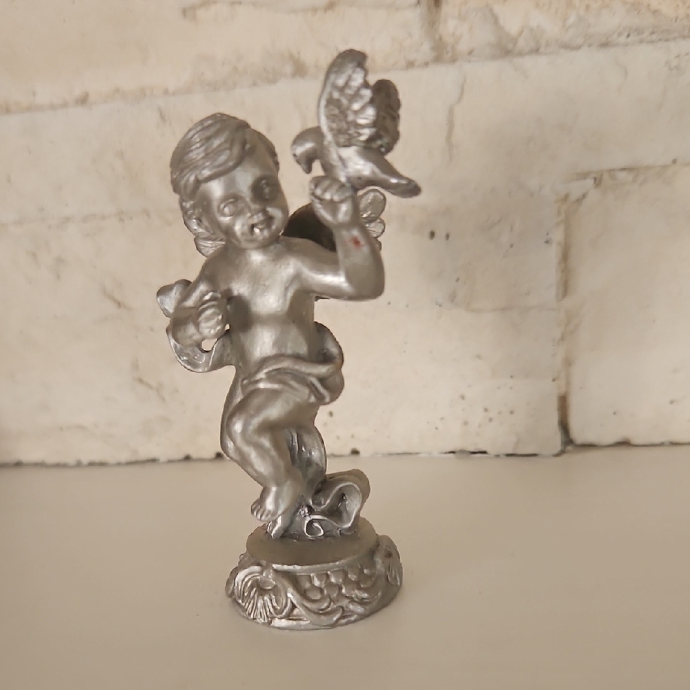 Vintage Pewter Cherub Angel Holding A Dove Figure.